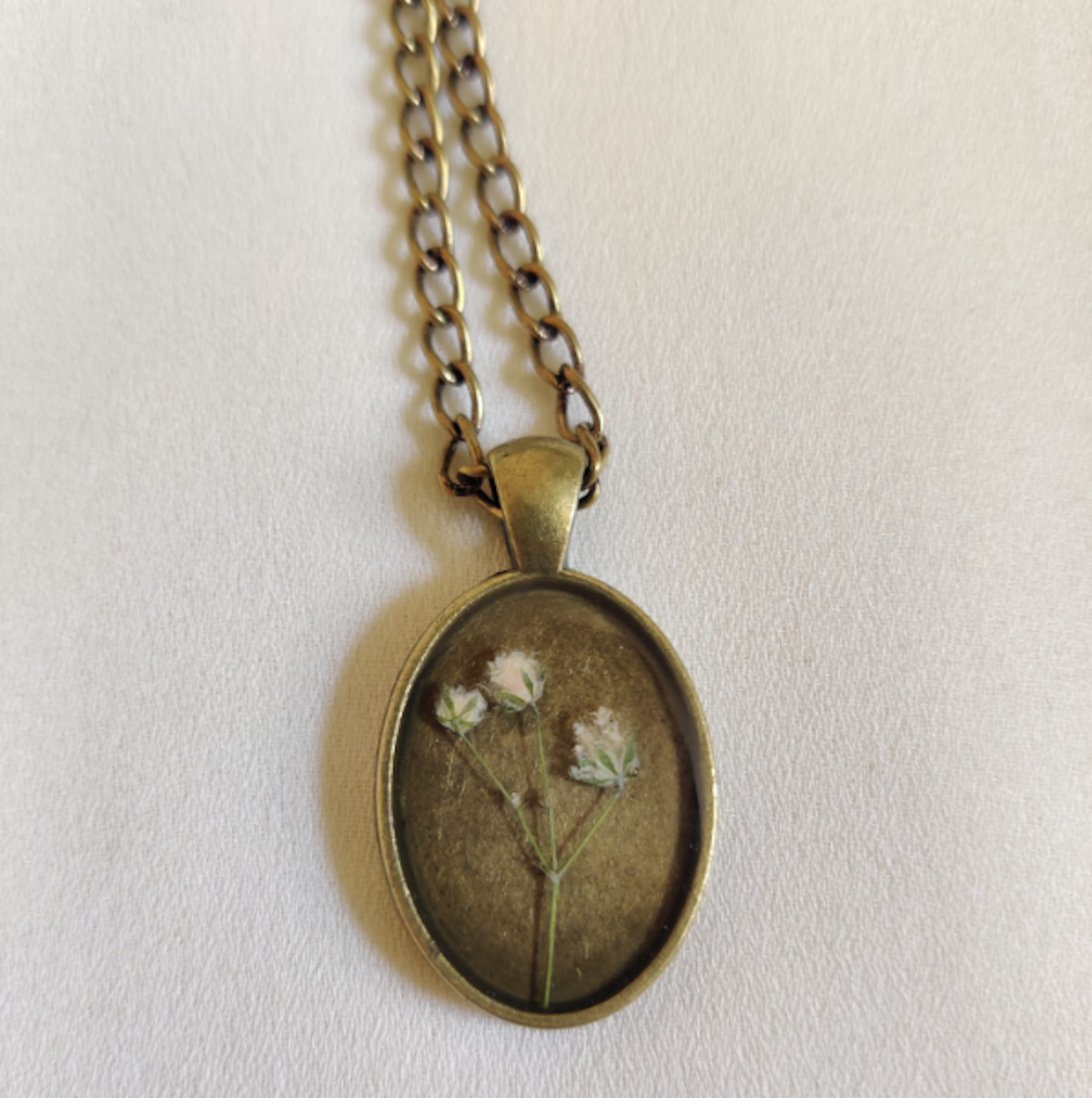 White gypsy vintage locket