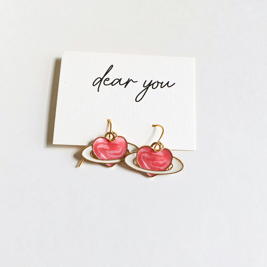 Saturn heart earrings