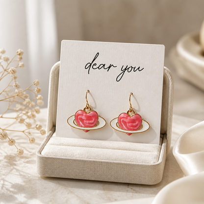 Saturn heart earrings